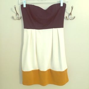 Strapless navy, gold, and white dress